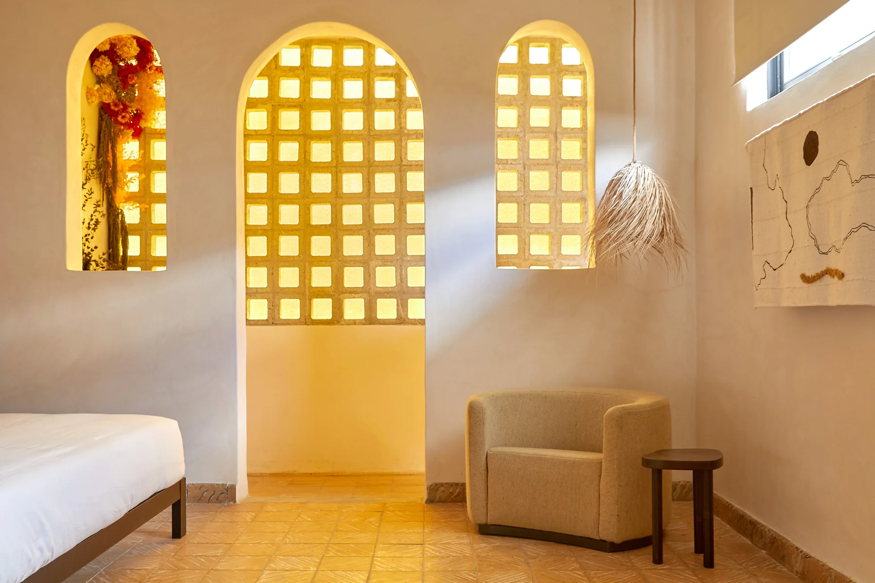 Natural light, warm materials and colorful furnishings at Duna in San Juan.