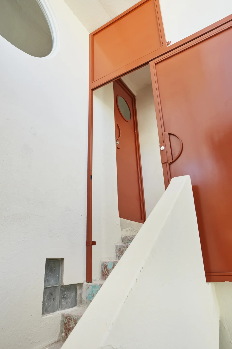 Red doors and the approach stair beside JA2’s terrace