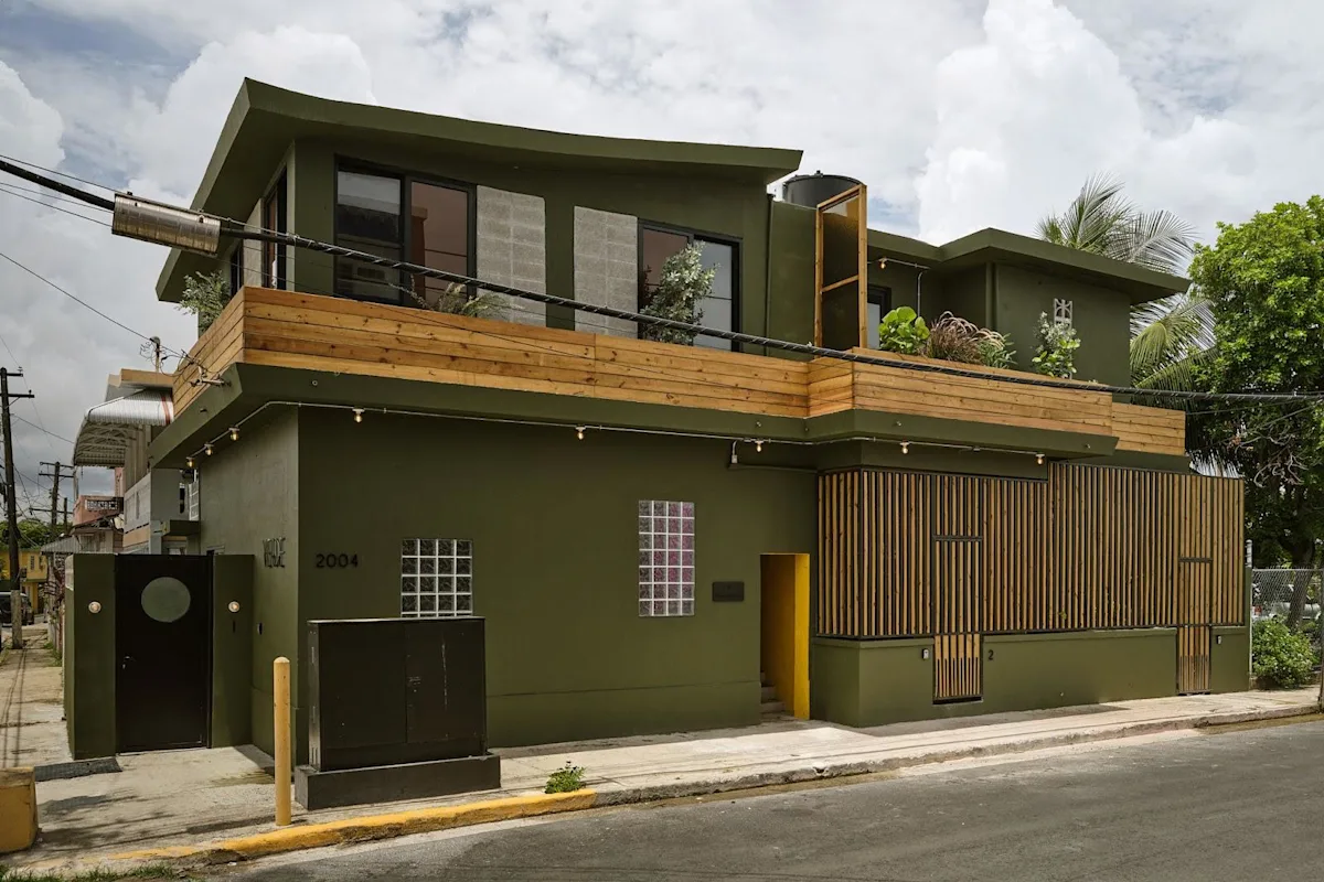 The street frontage of Verde by DW, a Dreamers Welcome apartment building in a residential San Juan neighborhood.
