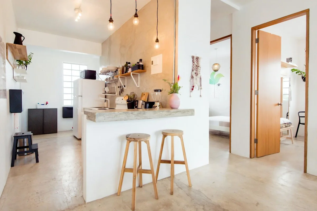 The kitchen and breakfast bar of an apartment at Tropicalia by DW in Ocean Park, San Juan.