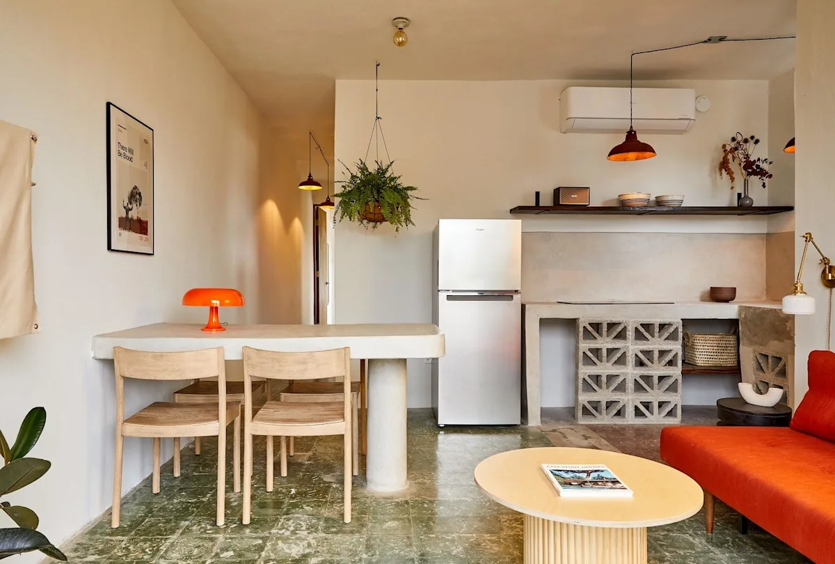 The kitchen and dining area of an apartment at APT by DW in Santurce, San Juan.