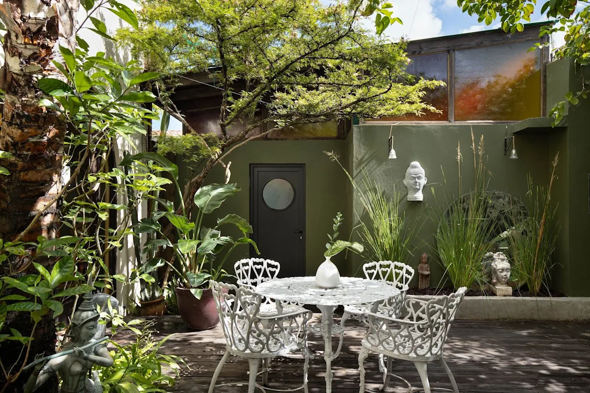 The planted courtyard at Dreamcatcher, the Dreamers Welcome boutique hotel in Ocean Park, San Juan.