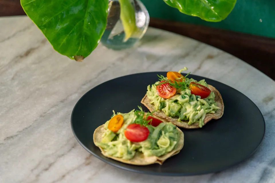 Avocado toast with cherry tomatoes, served at Dreamcatcher’s vegetarian breakfast