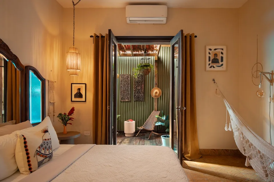 Window, curtains and hammock in the Muse Room