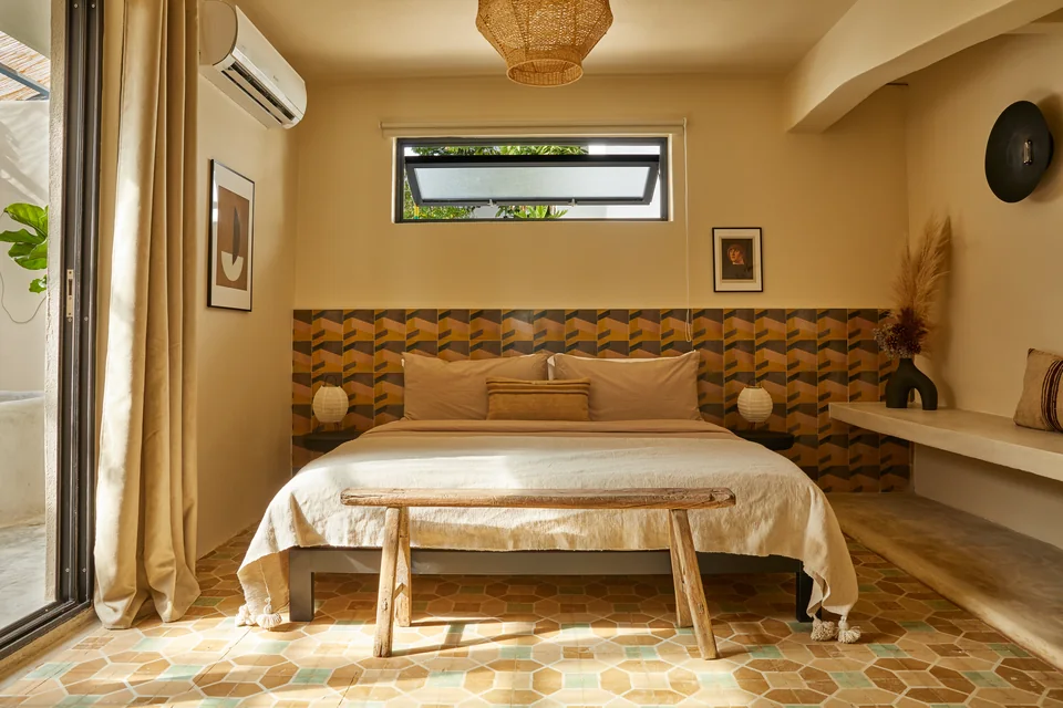 King bed and geometric tile headboard in Dreamer