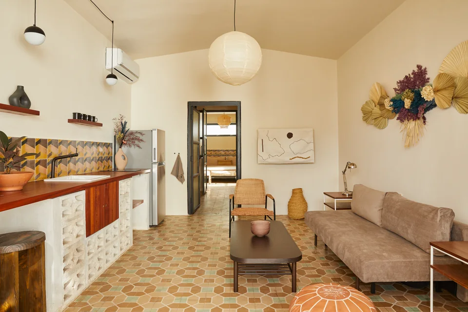 Open living room and full kitchen with vintage tiles in Dreamer