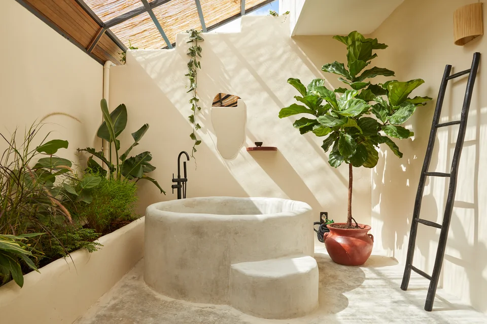 Custom outdoor concrete soaking tub on one of Dreamer’s private terraces