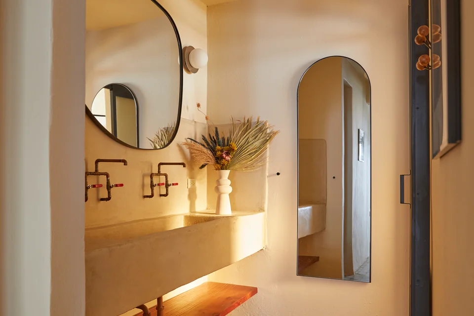Double vanity and rounded mirrors in Drifter’s bathroom
