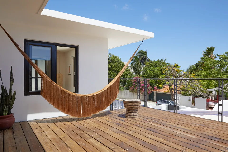 Hammock and bright open sky on Poet’s private terrace
