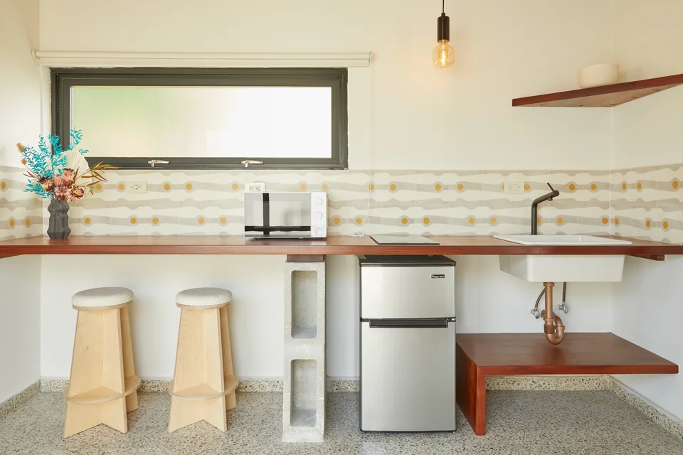 Compact kitchenette and breakfast counter in Traveler