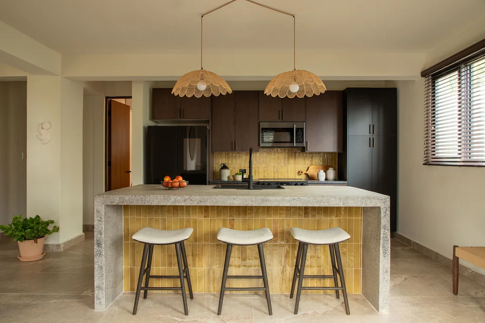 Kitchen island, stools and woven lights in MAO at Maru