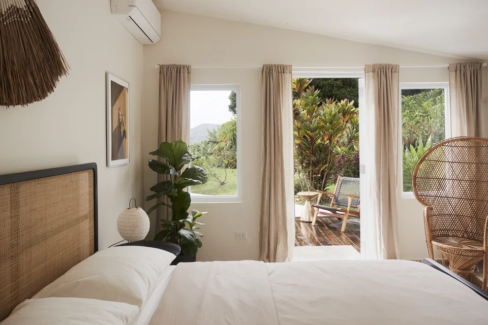 Wald Haus’s third bedroom opening onto a planted outdoor terrace